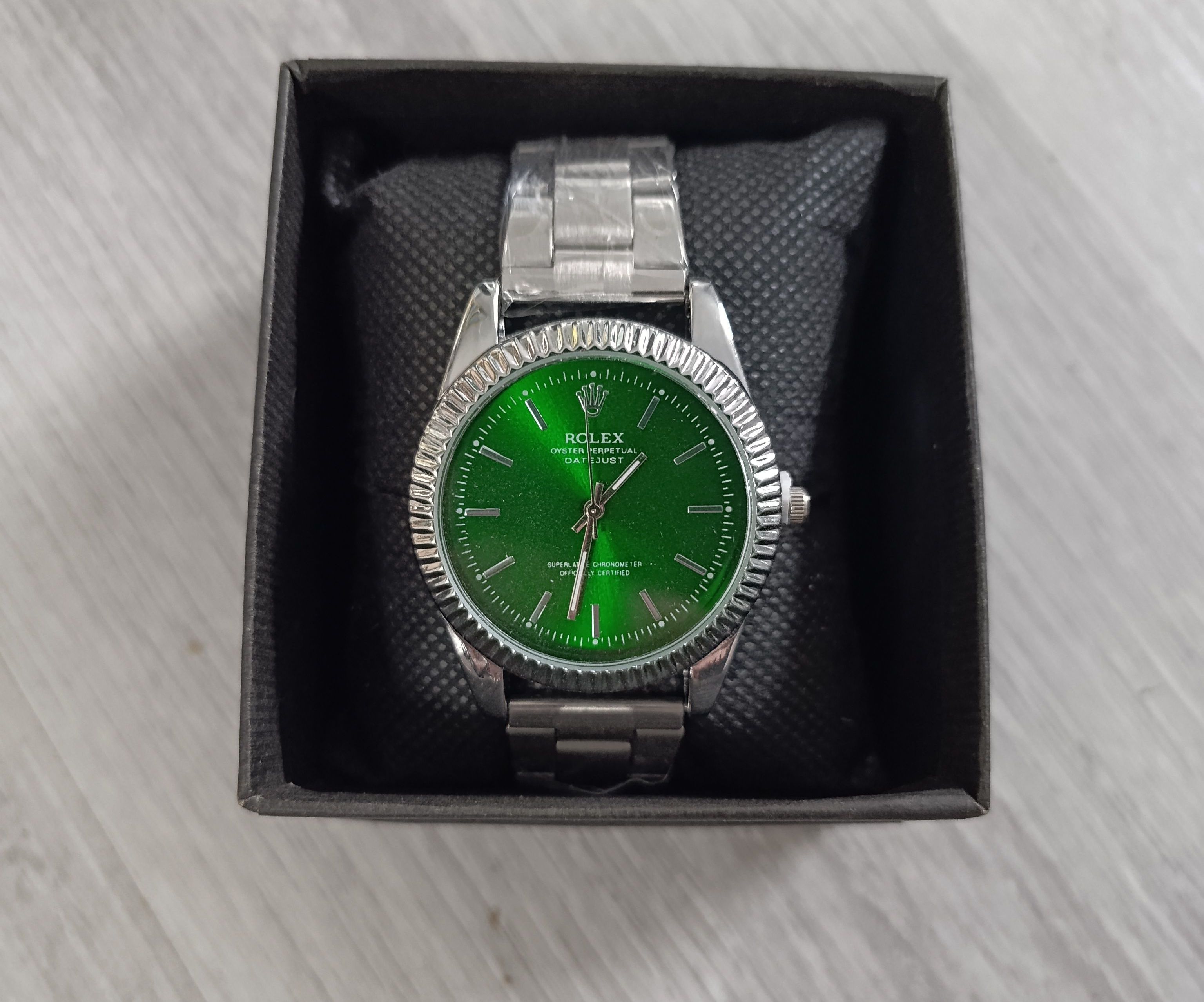 Reloj Rolex cara verde