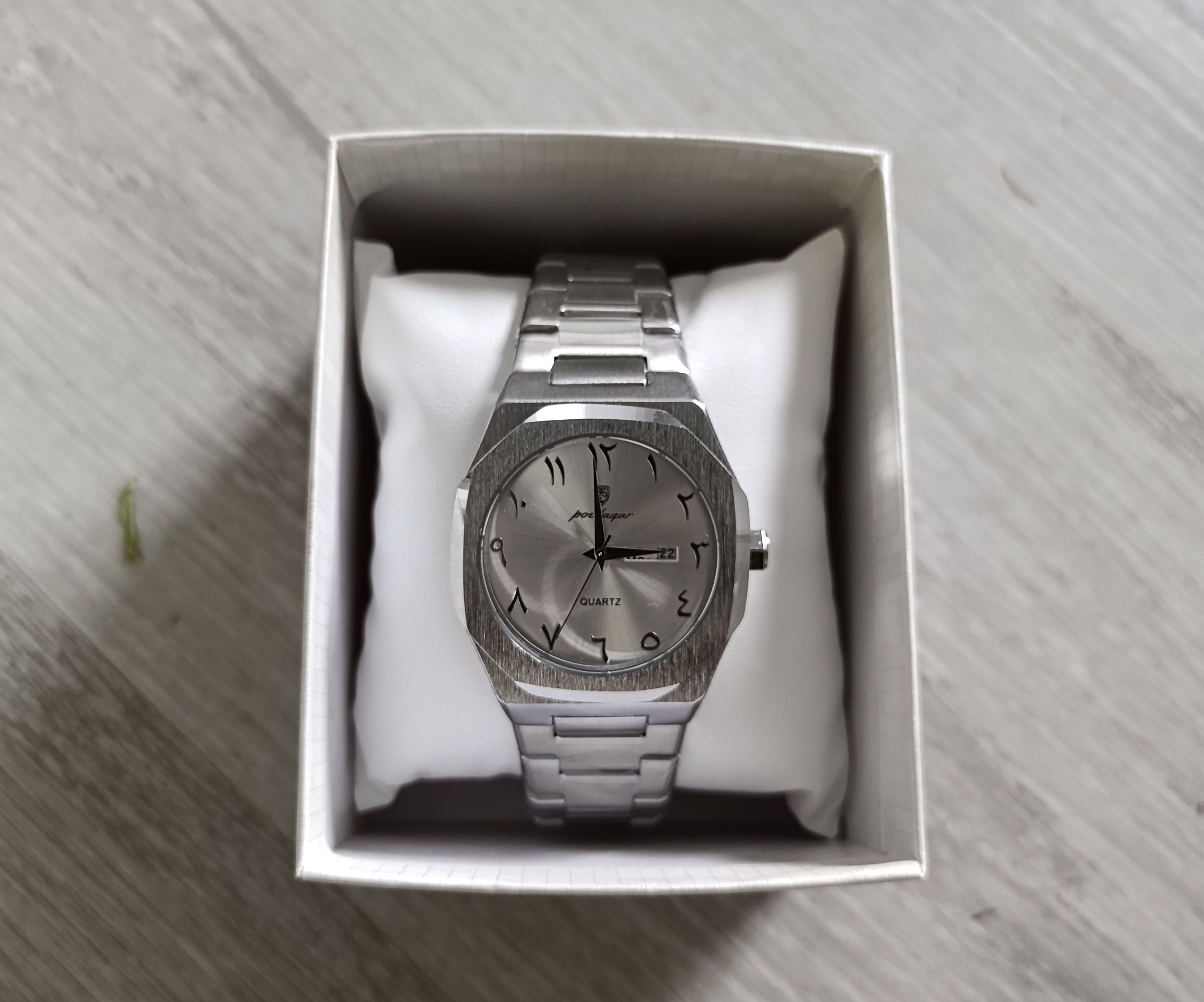 Reloj árabe plata