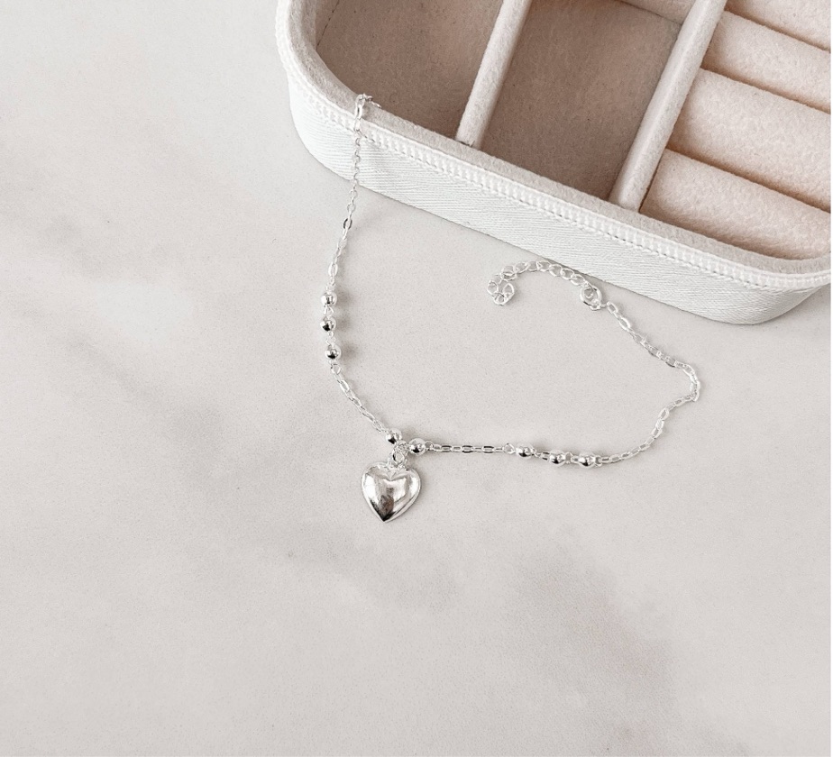 Pulseira entremeio pingente coração
