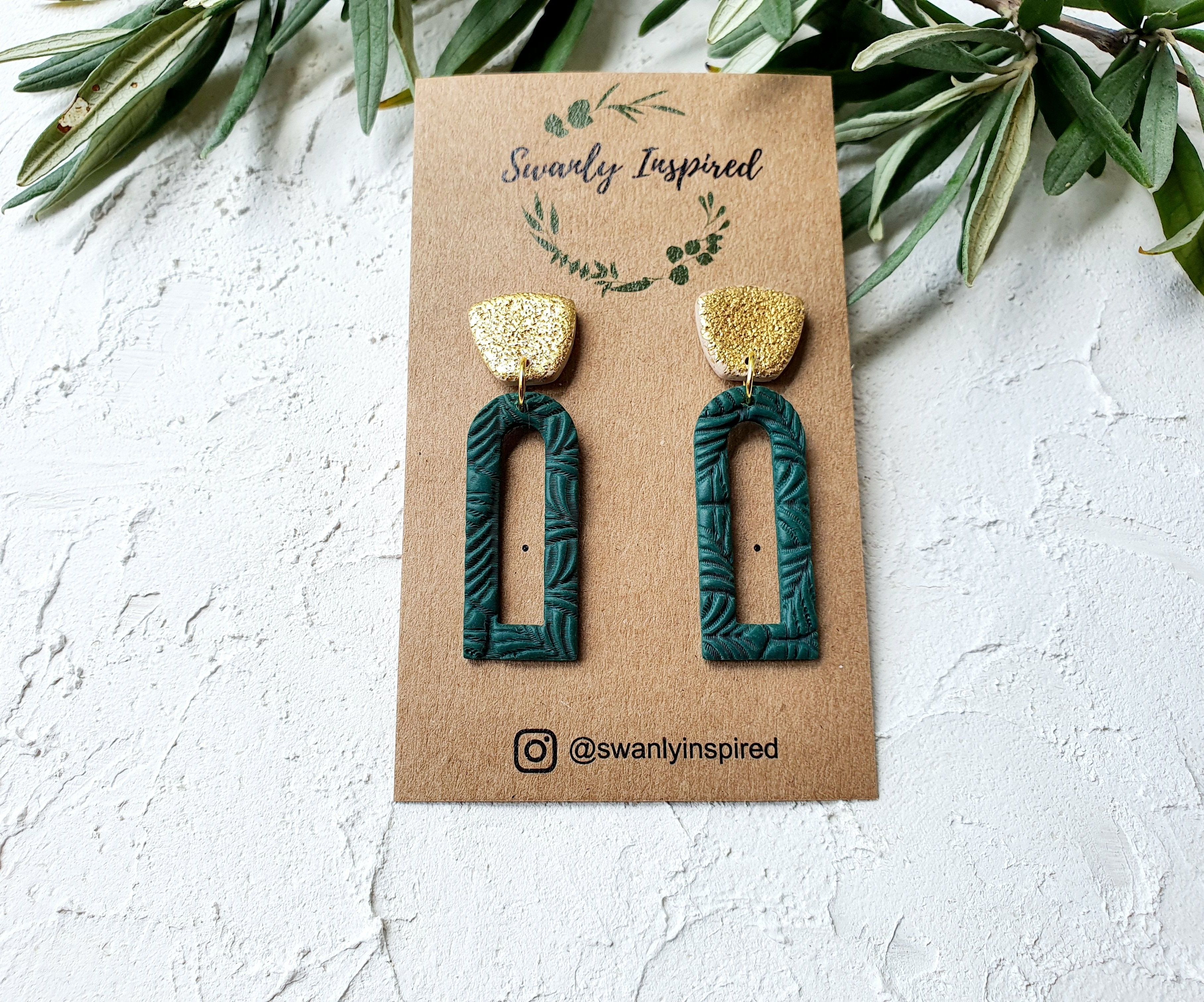 Emerald open arch with gold leaf