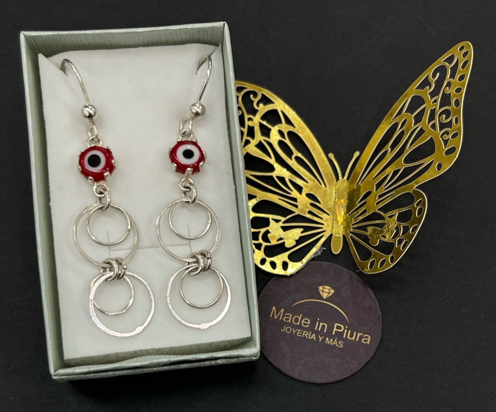 Arete colgante con aros y ojo turco .