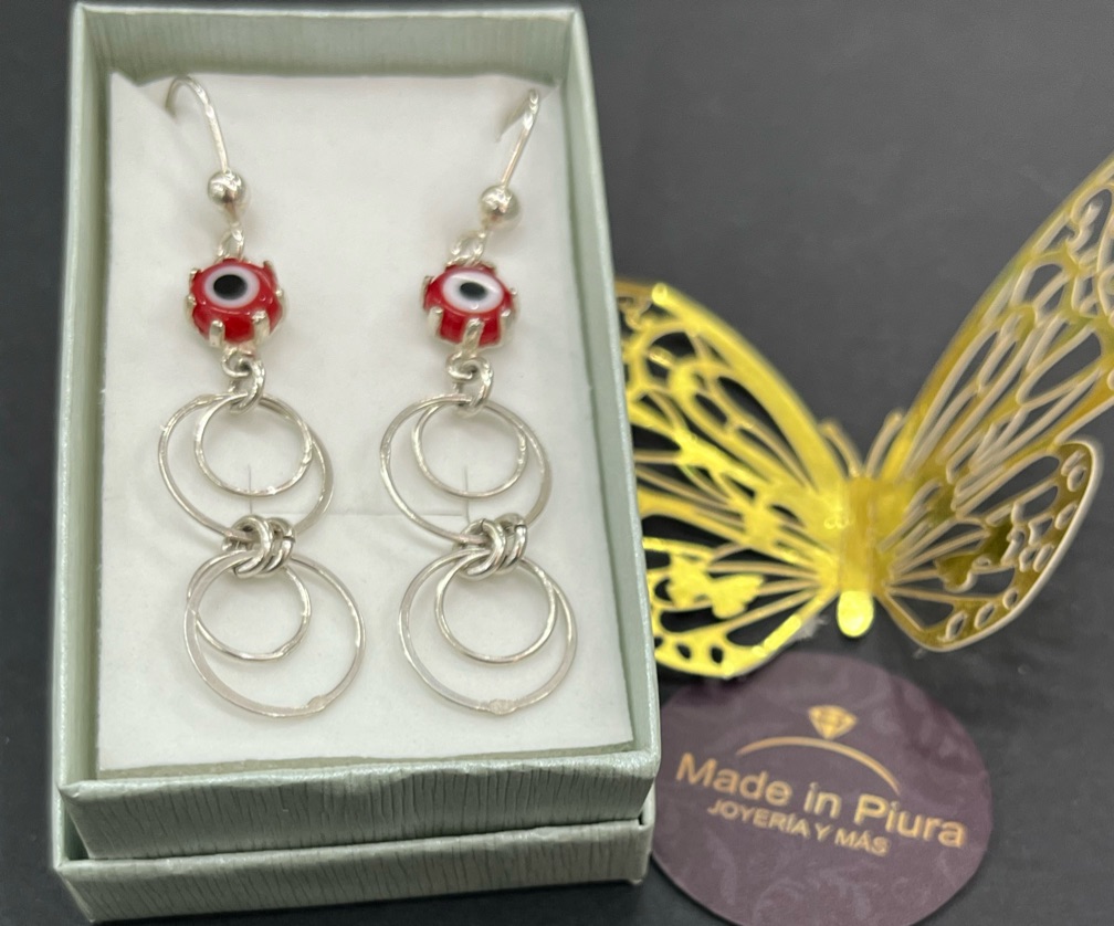 Arete colgante con aros y ojo turco .