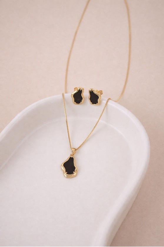 Conjunto orgânico Preto