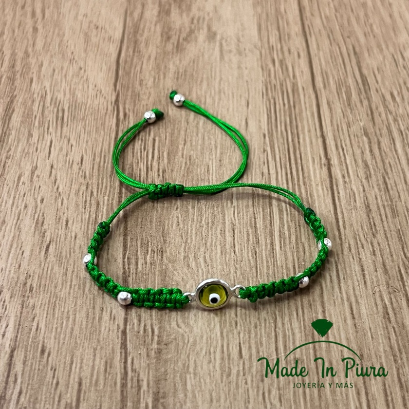 Pulsera tejida de Ojo turco verde enmarcado en plata.