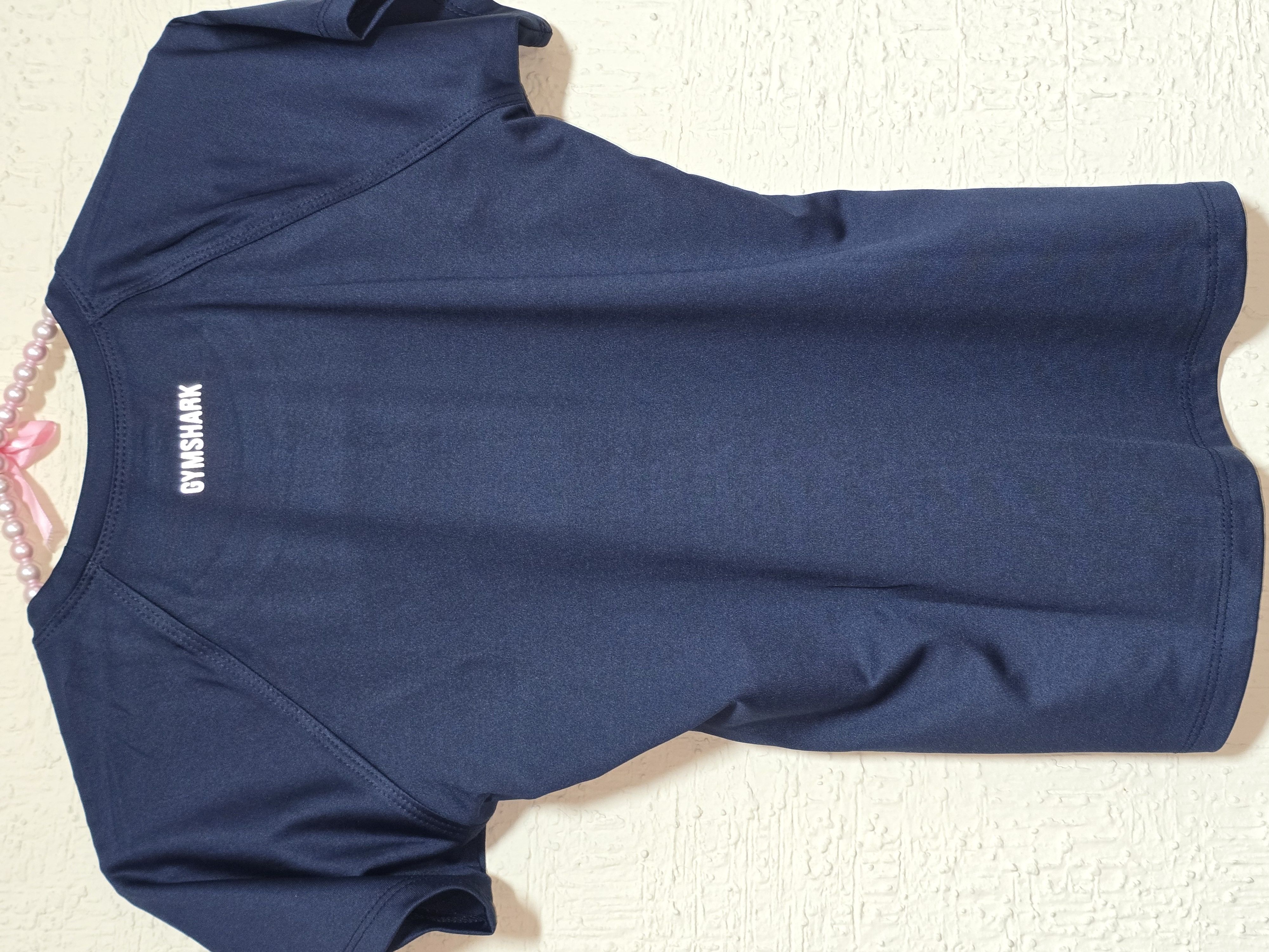 D1 Blusa GYMSHARK 09 en color azul y negro UNITALLA