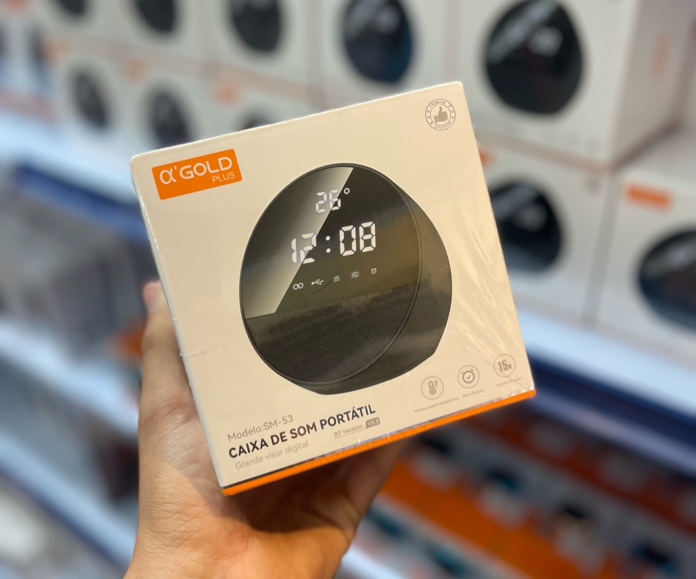 Caixa de som com relógio