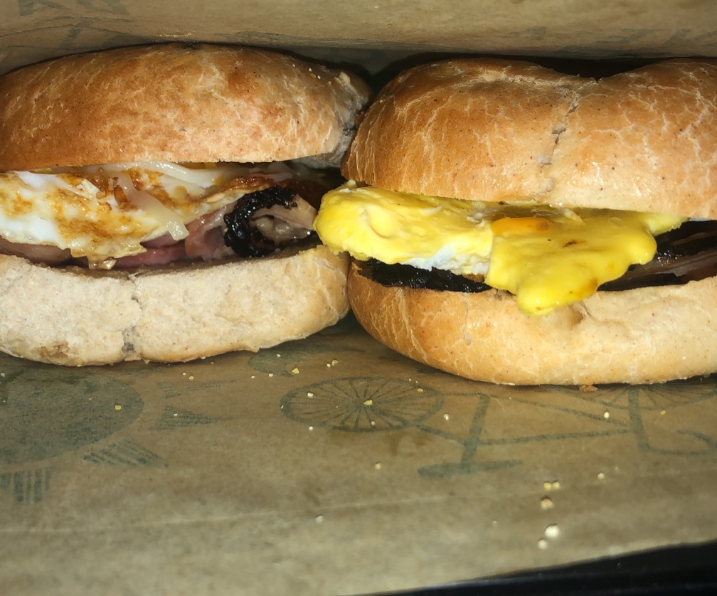Breakfast bagel sandwich with bacon