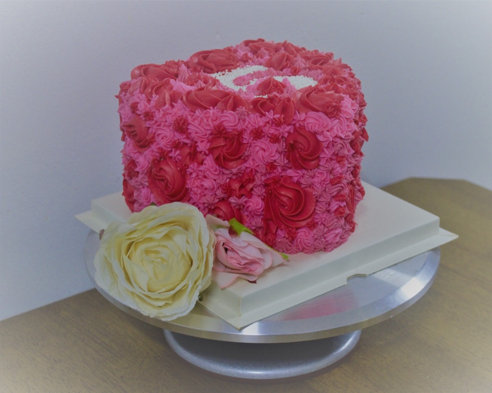 Chocolate heart shaped cake with vanilla buttercream frosting (8")
