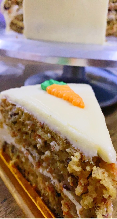 Carrotcake slice with creamcheese frosting
