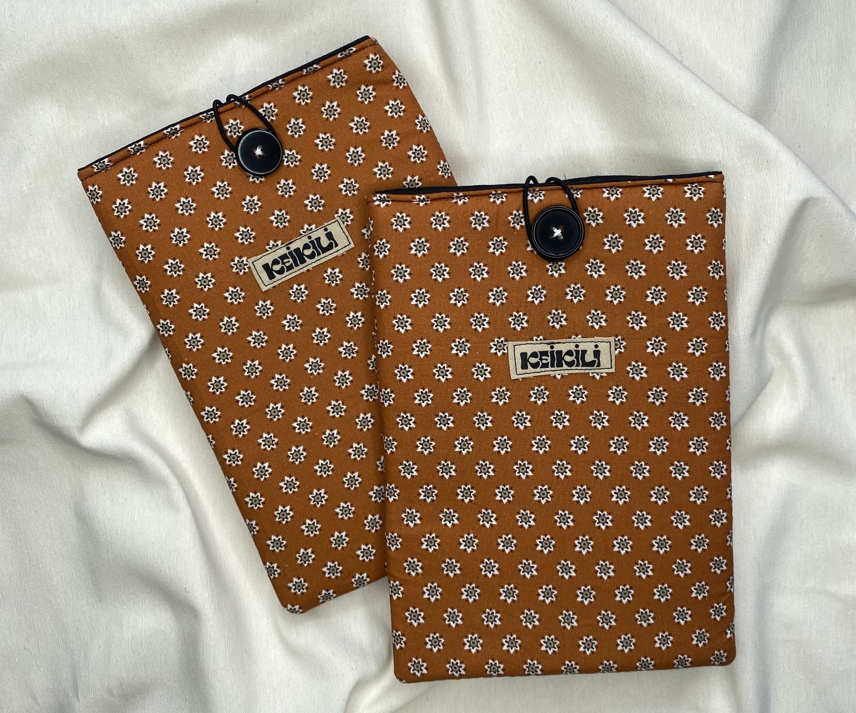 FUNDA PUKE KINDLE - FLORES NARANJAS
