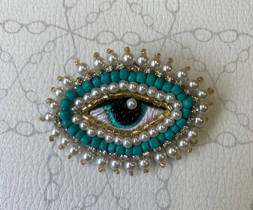 Broche olho grego blue